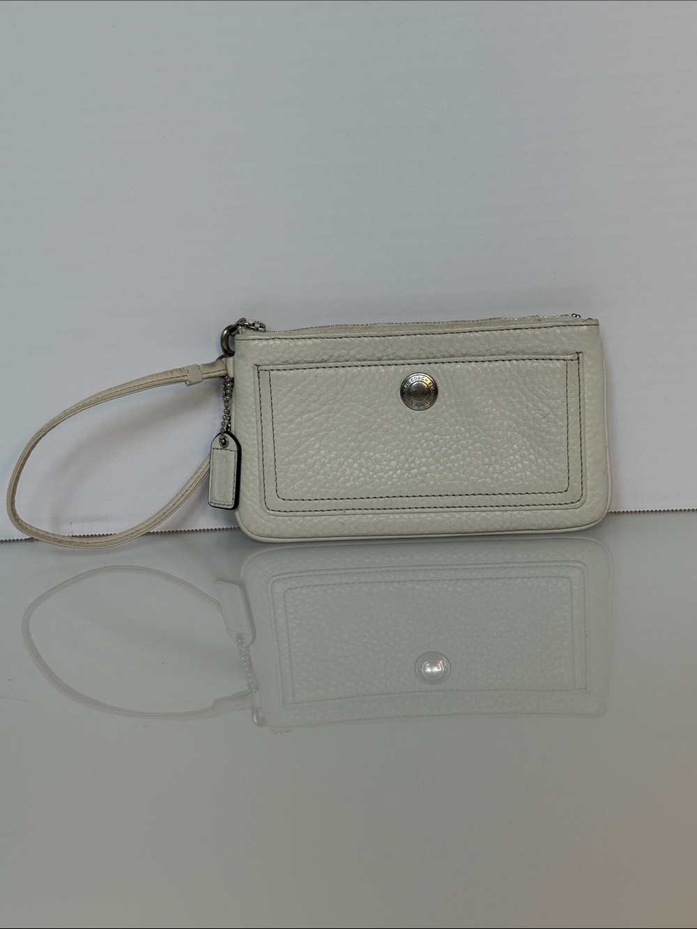 Coach Pebbled Leather Wristlet in Cream